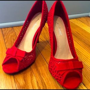 Red lace peep toe heeled pumps.  New
